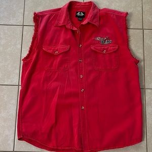 Biker sleeveless button up shirt.
